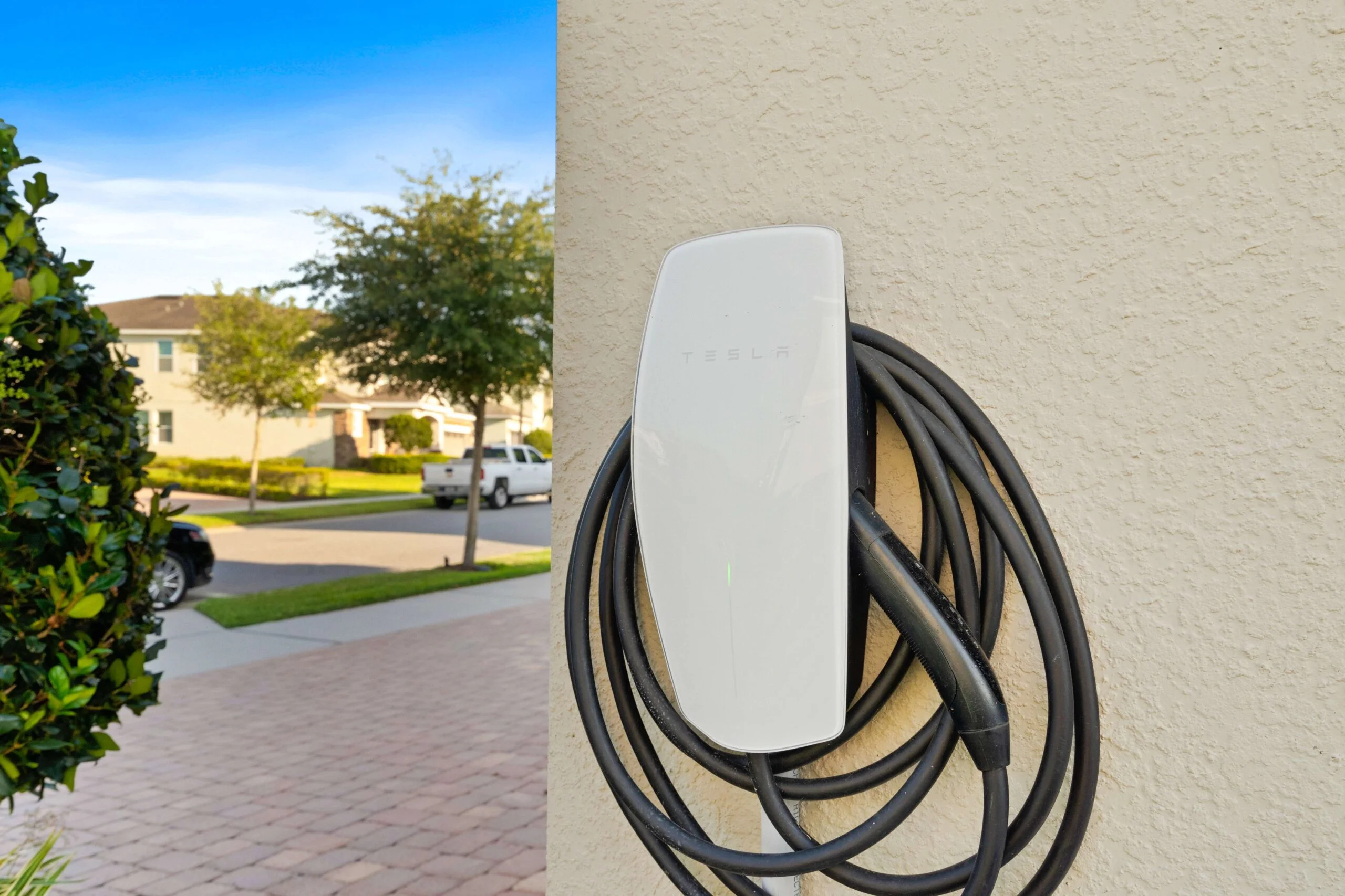 Tesla EV charger at 450 Burma vacation rental Kissimmee FL