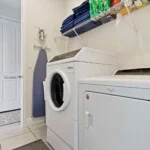 Laundry room with washer and dryer at 450 Burma vacation rental, Kissimmee FL