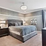 Master bedroom with adjustable split king bed at 450 Burma vacation rental near Disney World