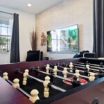 Living room with foosball table at 450 Burma vacation home