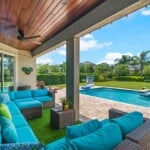 Covered patio with outdoor dining during daytime at 450 Burma