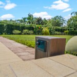 Outdoor pool radio with SiriusXM and Bluetooth at 450 Burma backyard